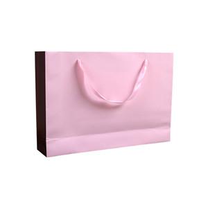 Custom recyclable retail pink christmas gift bag package jewelry wine art paper shopping bags with ribbon handles